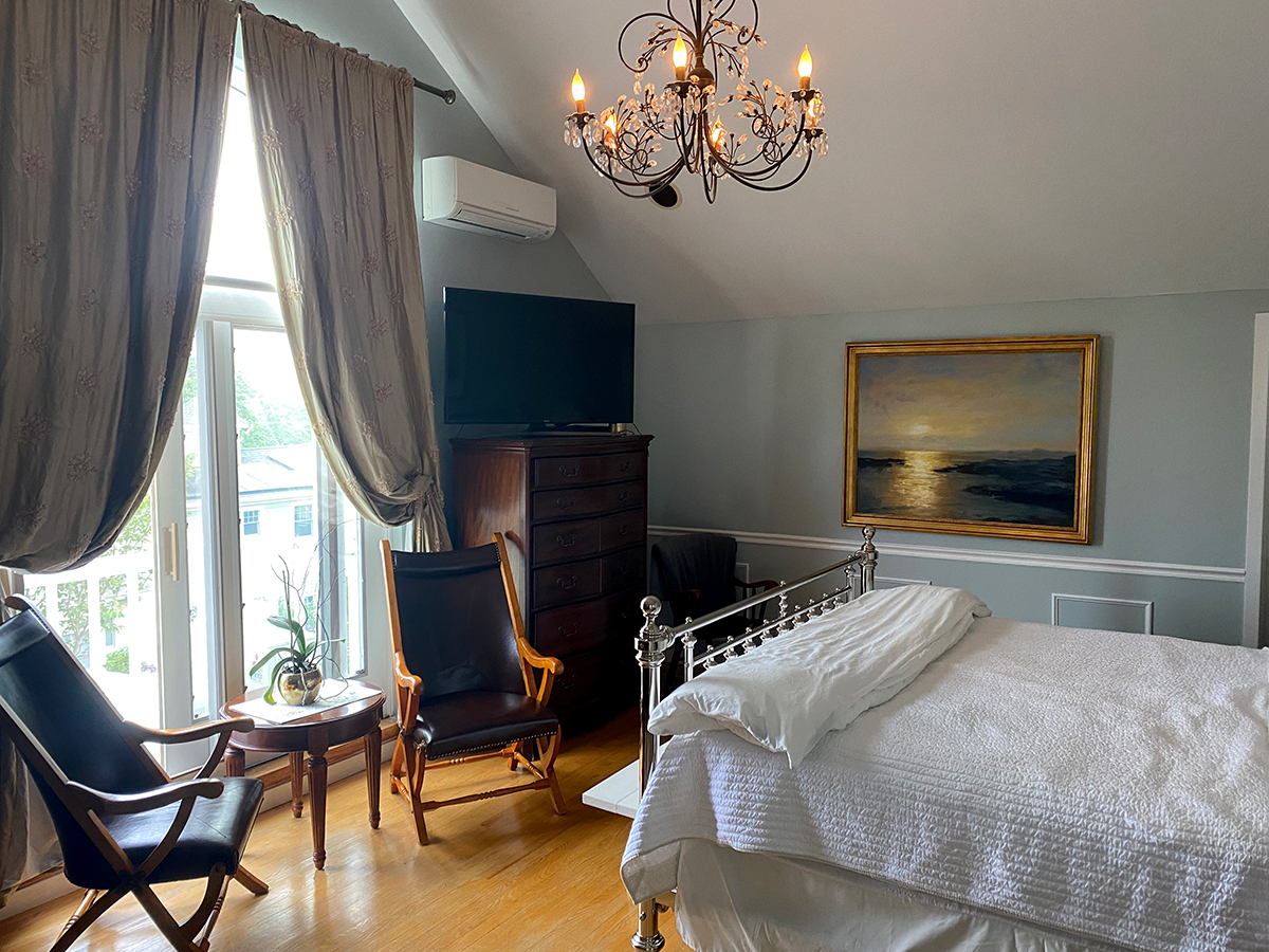 Master suite with a king size bed